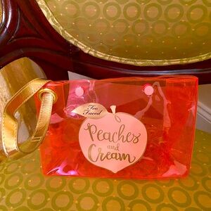 Too faced transparent cosmetic wristlet